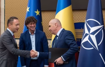 Bolojan discută cu CEO Schwarz despre producția locală